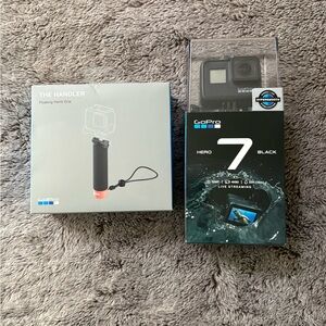 GoPro HERO7 Black Camera with The Handler Floating Hand Grip